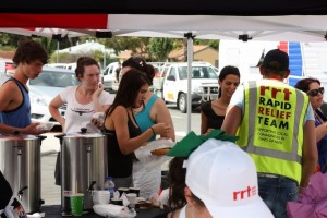 RRT supplying food and drinks to community members at the evacuation centre.