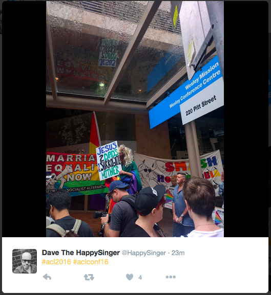 The protest outside the ACL conference. Credit: Twitter