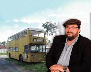 John Donoghue with the 1975 bus he plans to convert to a mobile cafe.