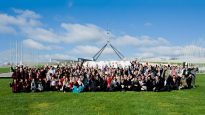 Micah conducting a protest outside Canberra's Parliament House.