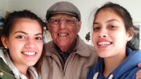 Claudia, aged 16, with grandfather Geoff Horne and her sister Francesca, 14.