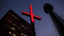 It's not Christians who should be offended by the bright-red inverted crosses, argues Michael Jensen.