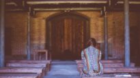 Woman in church alone
